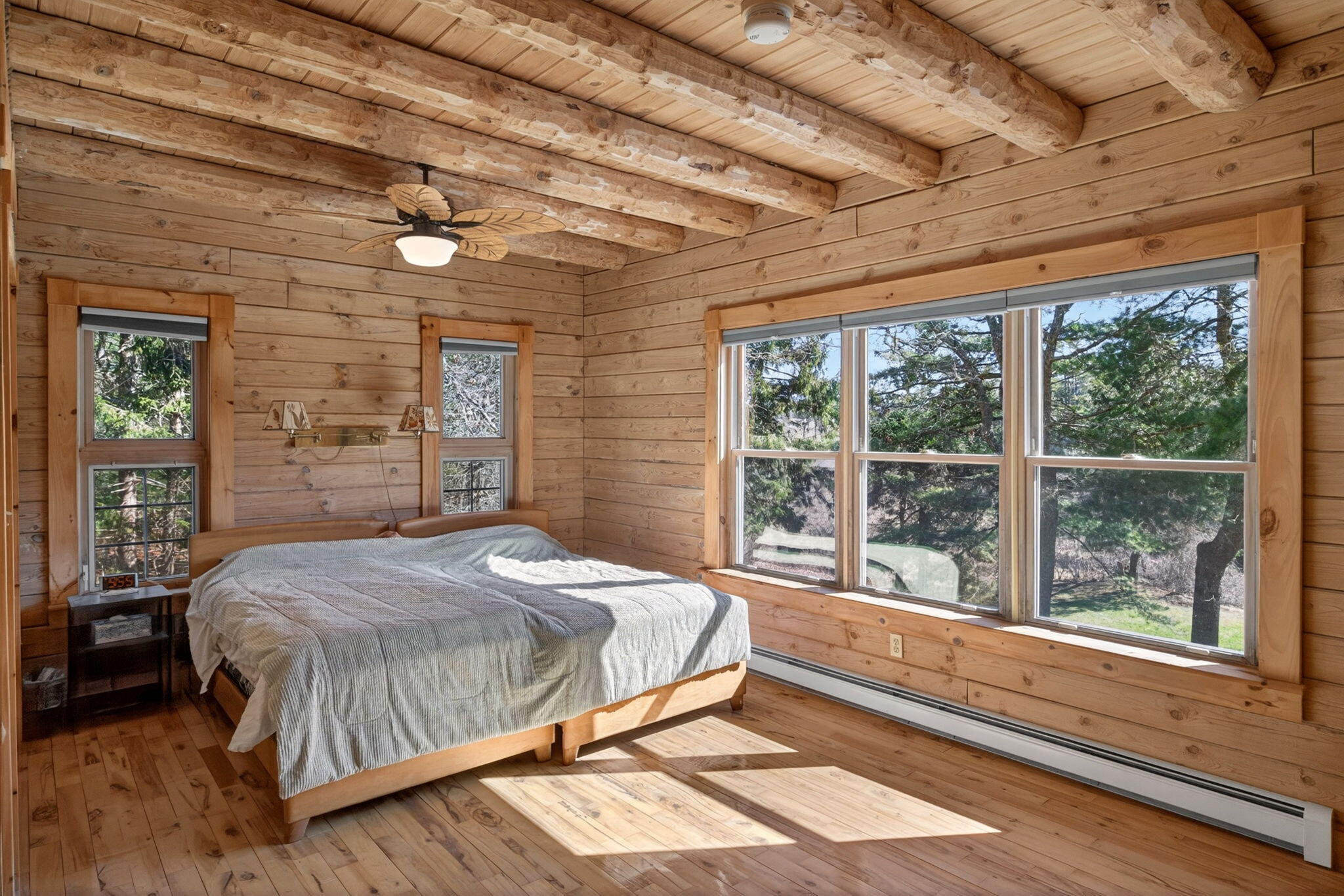 73 County Road Bourne, MA 02532 - Photo 25 of 91 a bedroom with a large bed and a large window