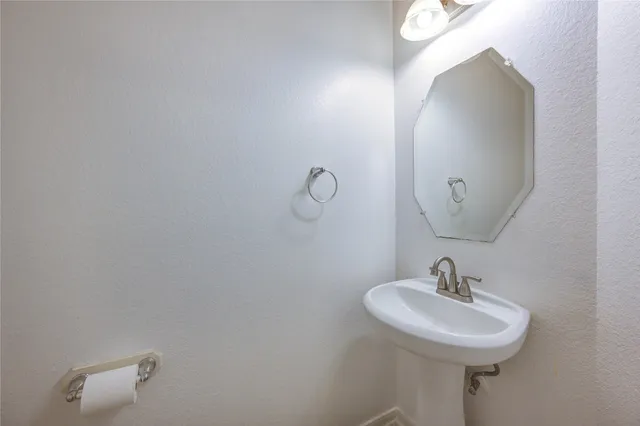 a kitchen with stainless steel appliances granite countertop a stove microwave and refrigerator