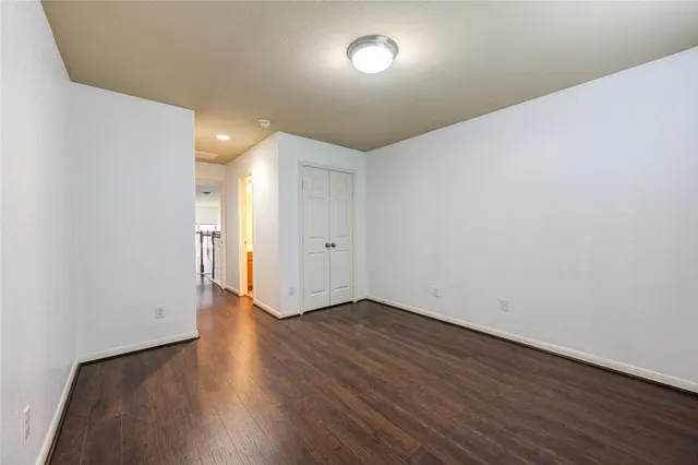 a view of a livingroom with wooden floor