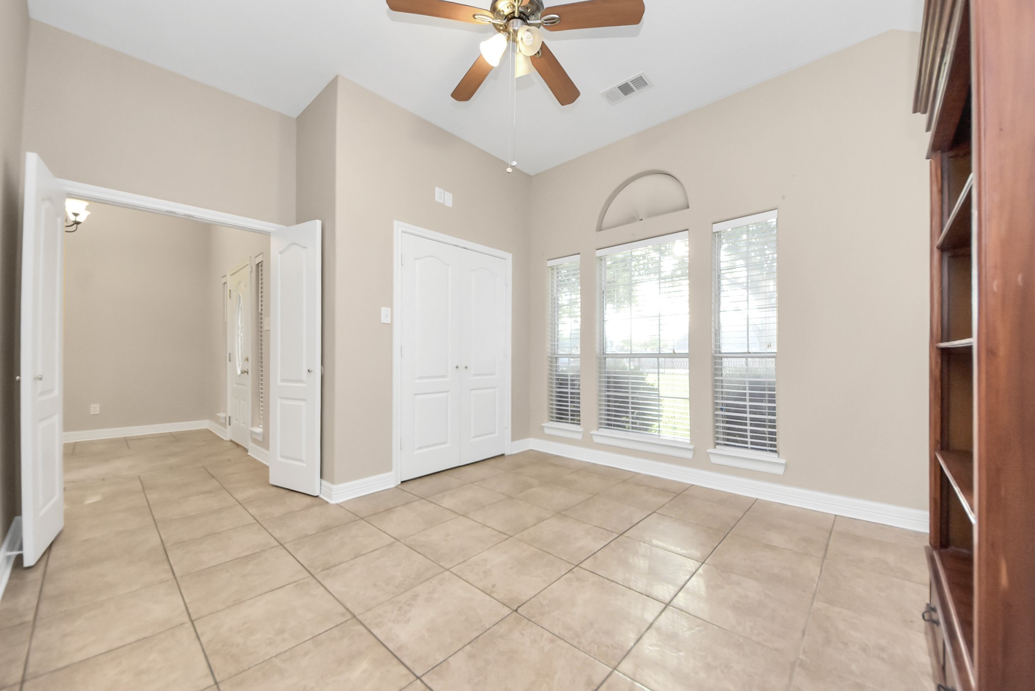 4320 Barkaloo Road Baytown, TX 77521 - Photo 11 of 28 a view of an empty room with a window