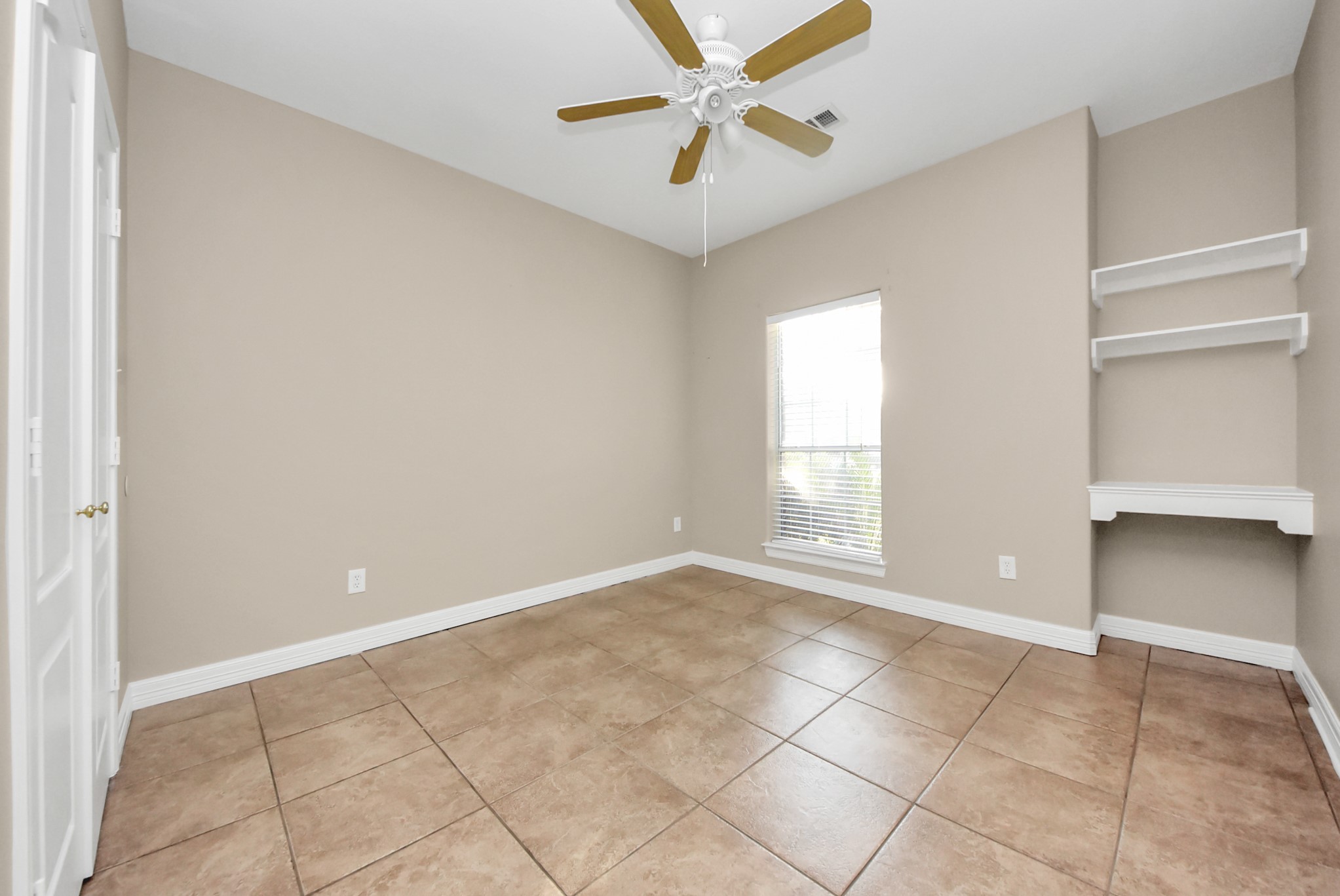 4320 Barkaloo Road Baytown, TX 77521 - Photo 18 of 28 a view of an empty room with a window