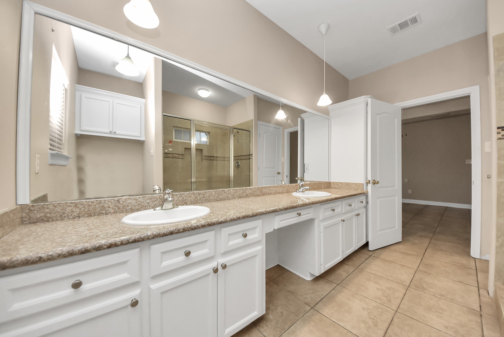 4320 Barkaloo Road Baytown, TX 77521 - Photo 27 of 28 a bathroom with a granite countertop sink and a mirror