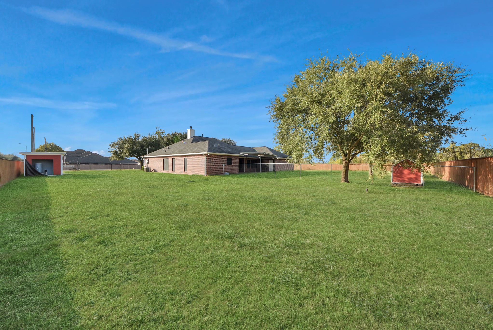 4320 Barkaloo Road Baytown, TX 77521 - Photo 5 of 28 a view of a house with a big yard