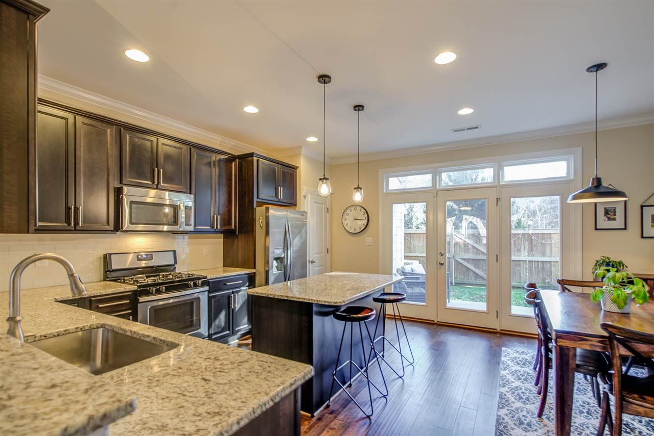 530 Ledbetter Court Raleigh, NC 27608 - Photo 13 of 29 Bright & Open to Back Patio