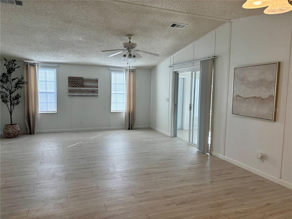 1622 Southwest 35th Circle Okeechobee, FL 34974 - Photo 6 of 19 a view of an empty room with a window