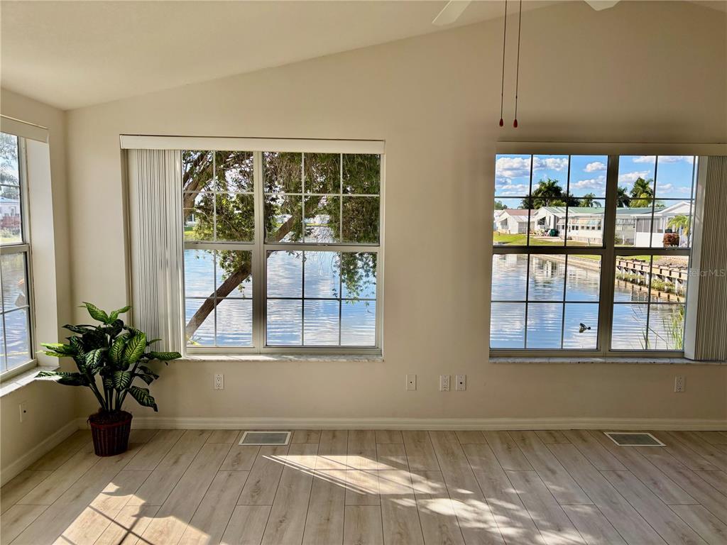 1622 Southwest 35th Circle Okeechobee, FL 34974 - Photo 7 of 19 a view of an empty room with a window