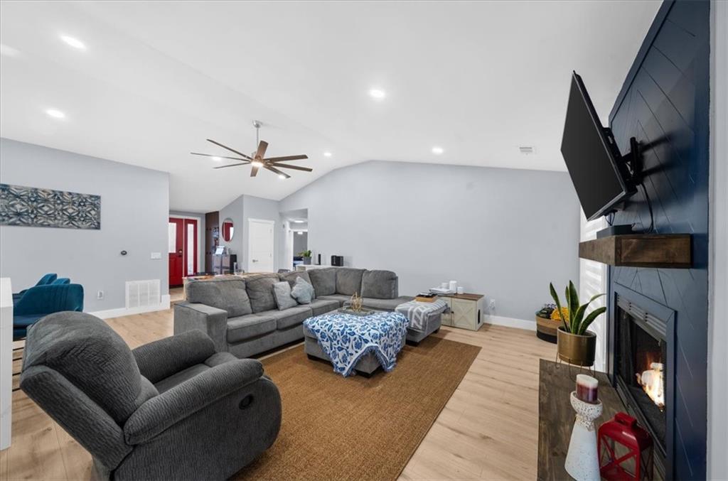 5802 Bay Pointe Sound Acworth, GA 30101 - Photo 14 of 41 a living room with furniture and a fireplace