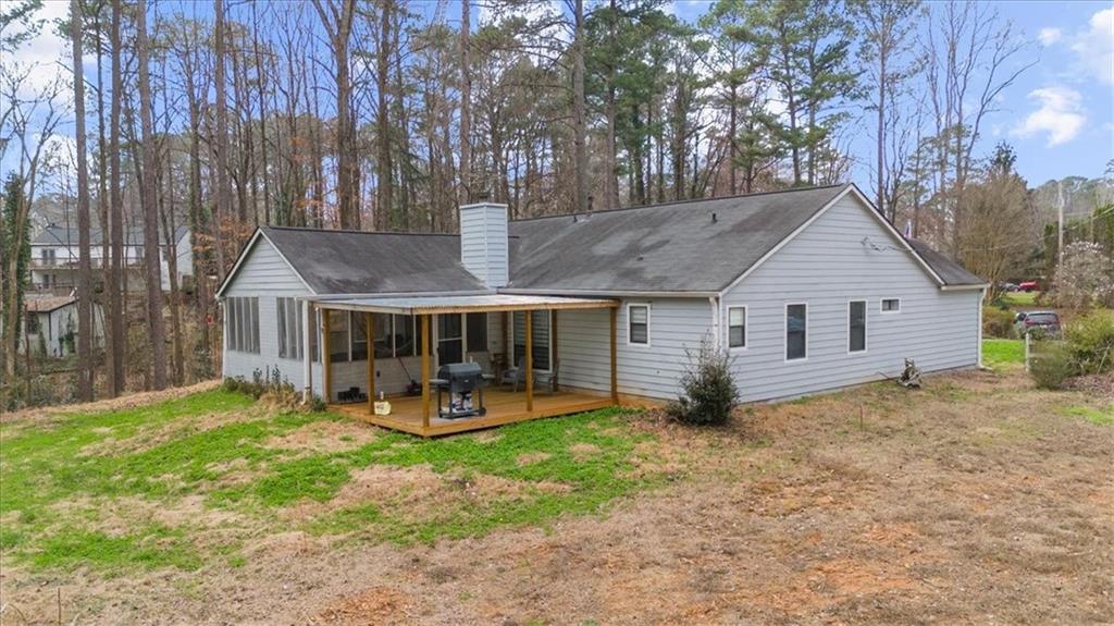 5802 Bay Pointe Sound Acworth, GA 30101 - Photo 36 of 41 a view of a house with backyard and a tree