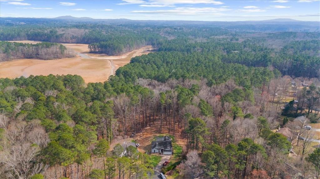 5802 Bay Pointe Sound Acworth, GA 30101 - Photo 38 of 41 a view of a lake with a yard