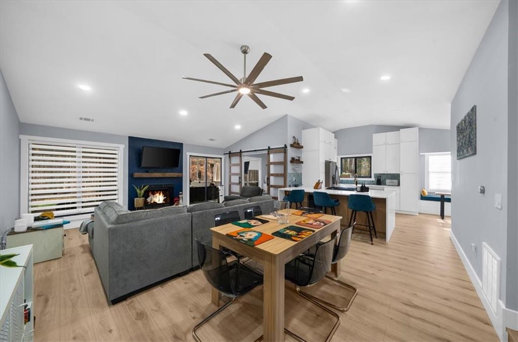 5802 Bay Pointe Sound Acworth, GA 30101 - Photo 8 of 41 a living room with furniture and a flat screen tv