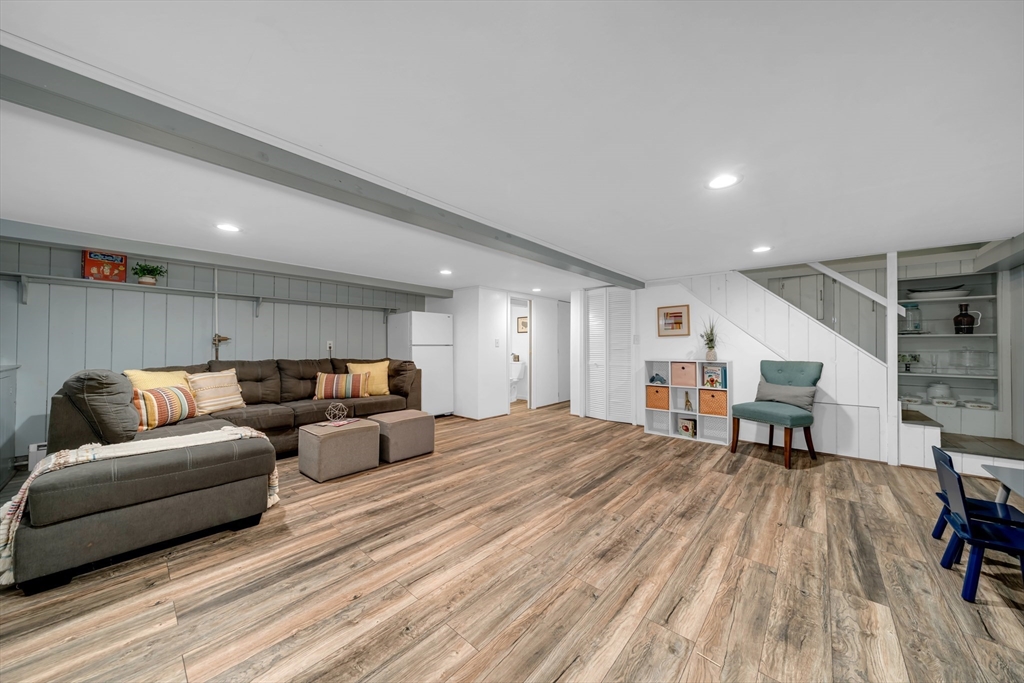 69 Pond Street Georgetown, MA 01833 - Photo 20 of 30 a living room with furniture and a wooden floor