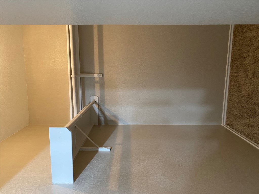 304 Azurite Drive Jarrell, TX 76537 - Photo 18 of 24 Spacious closet featuring dark carpet