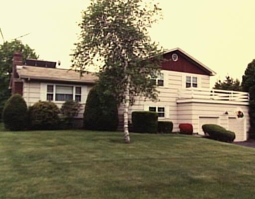 25 Clover Hill Road Trumbull, CT 06611 - Photo 1 of 1 a view of a house with backyard