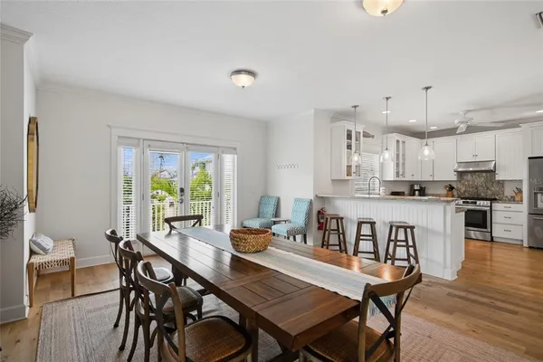 a kitchen with granite countertop stainless steel appliances and wooden cabinets