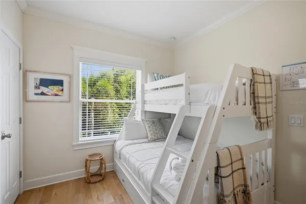 a bathroom with a granite countertop sink toilet a mirror a vanity and shower
