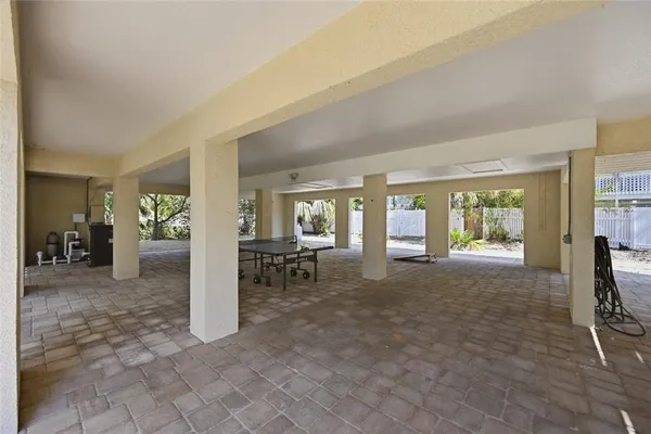 a view of swimming pool with chairs