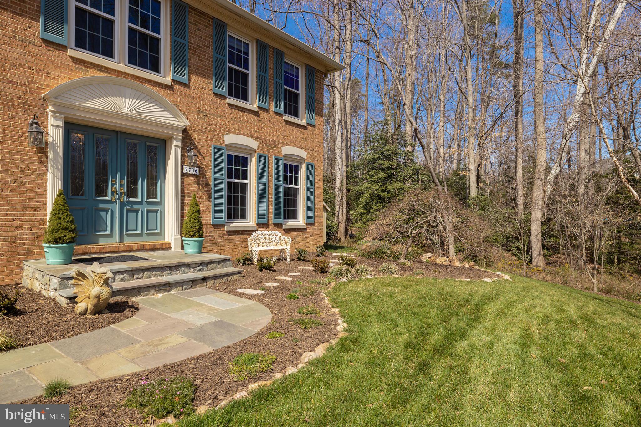 7736 Huntsman Boulevard Springfield, VA 22153 - Photo 65 of 70 Flagstone front walk