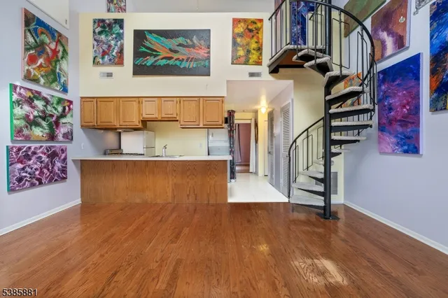 a view of an empty room with shelves