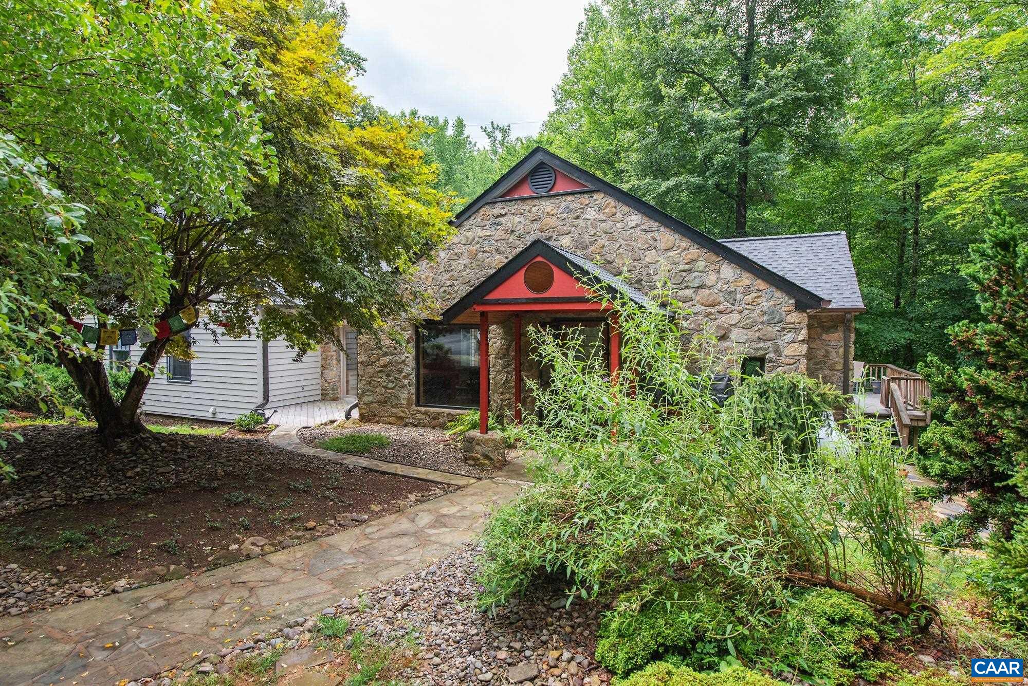 1091 Tilman Road Charlottesville, VA 22901 - Photo 1 of 17 a front view of a house with yard