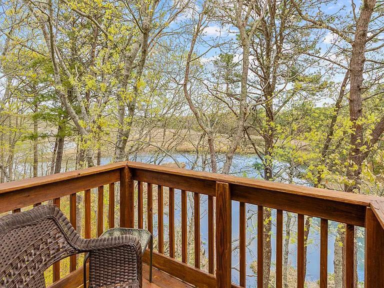 15 Riverview Avenue, Unit D Mashpee, MA 02649 - Photo 33 of 33 a view of balcony with wooden fence and floor