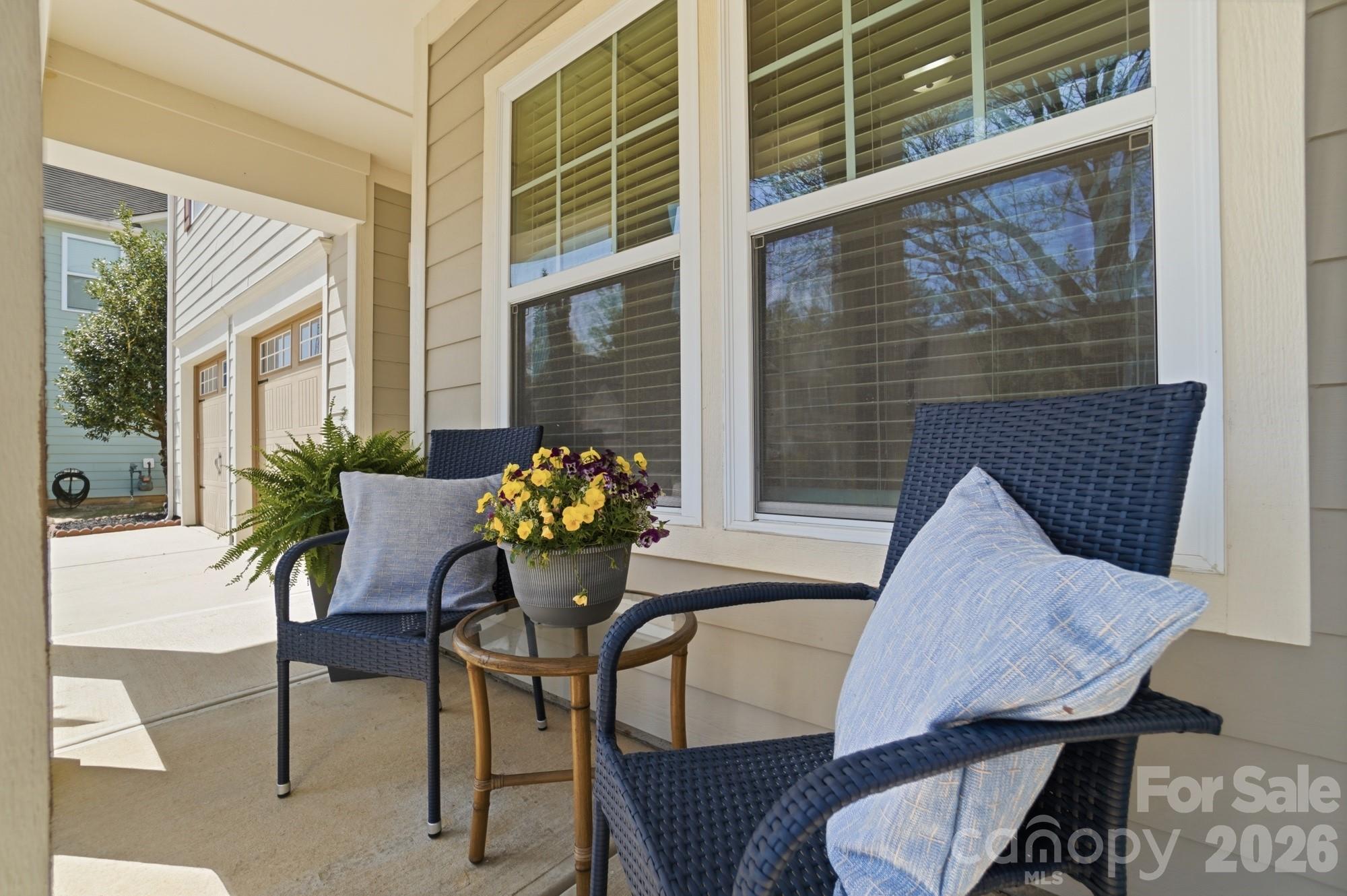 2153 Bluebell Way Tega Cay, SC 29708 - Photo 5 of 48 a view of a dining room with furniture and window