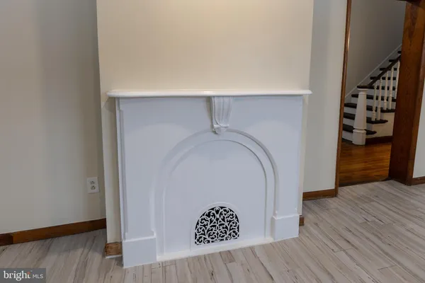 an empty room with a empty space and windows