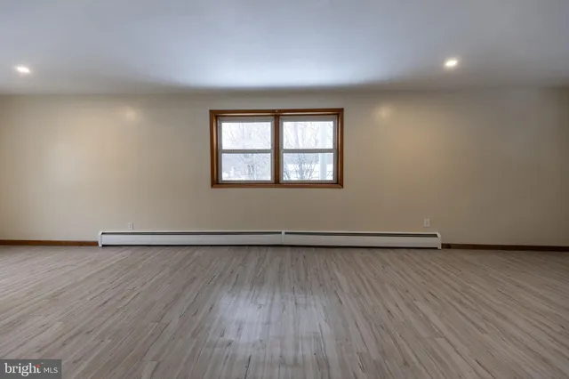 an empty room with a window