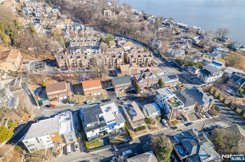 13 Casta Lane, Unit 1 Edgewater, NJ 07020 - Photo 17 of 25 an aerial view of a city with lots of residential buildings