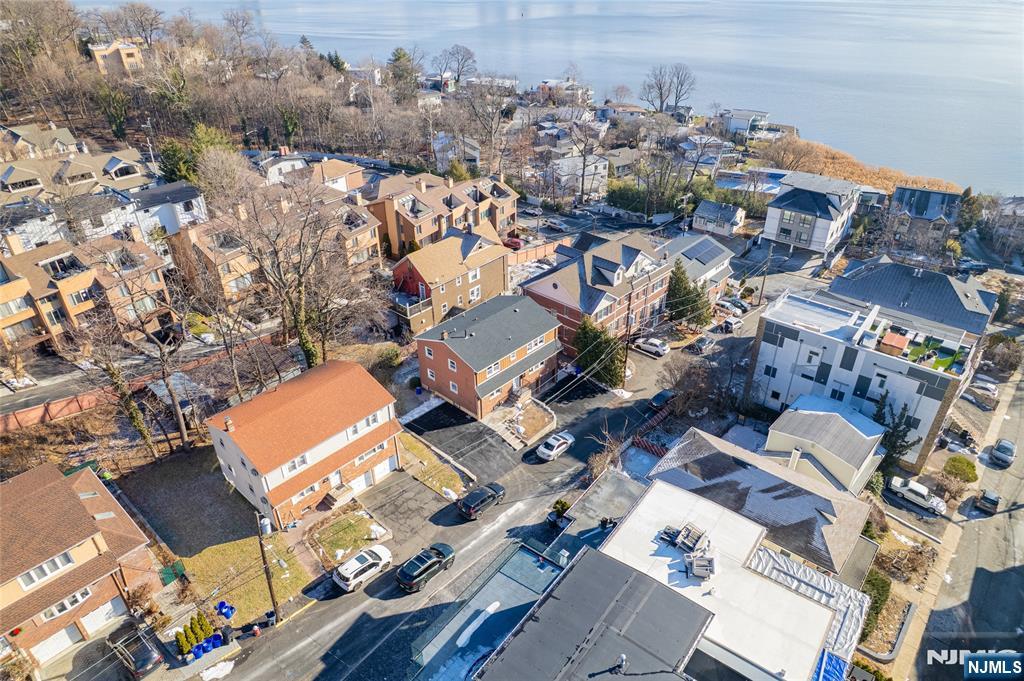 13 Casta Lane, Unit 1 Edgewater, NJ 07020 - Photo 20 of 25 an aerial view of a city with lots of residential buildings