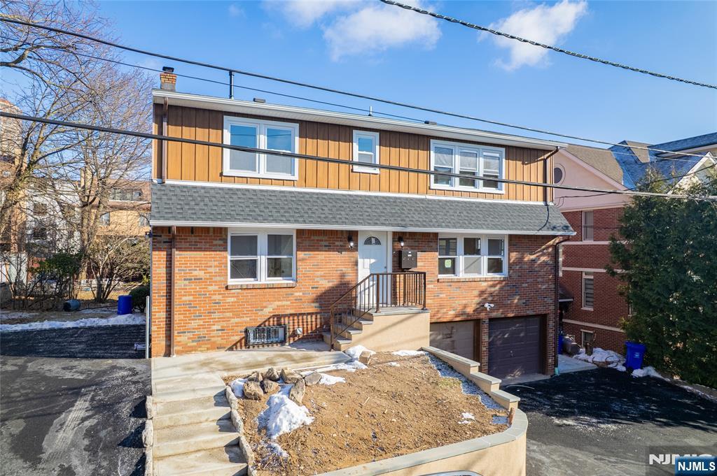 13 Casta Lane, Unit 1 Edgewater, NJ 07020 - Photo 21 of 25 a view of a house with backyard