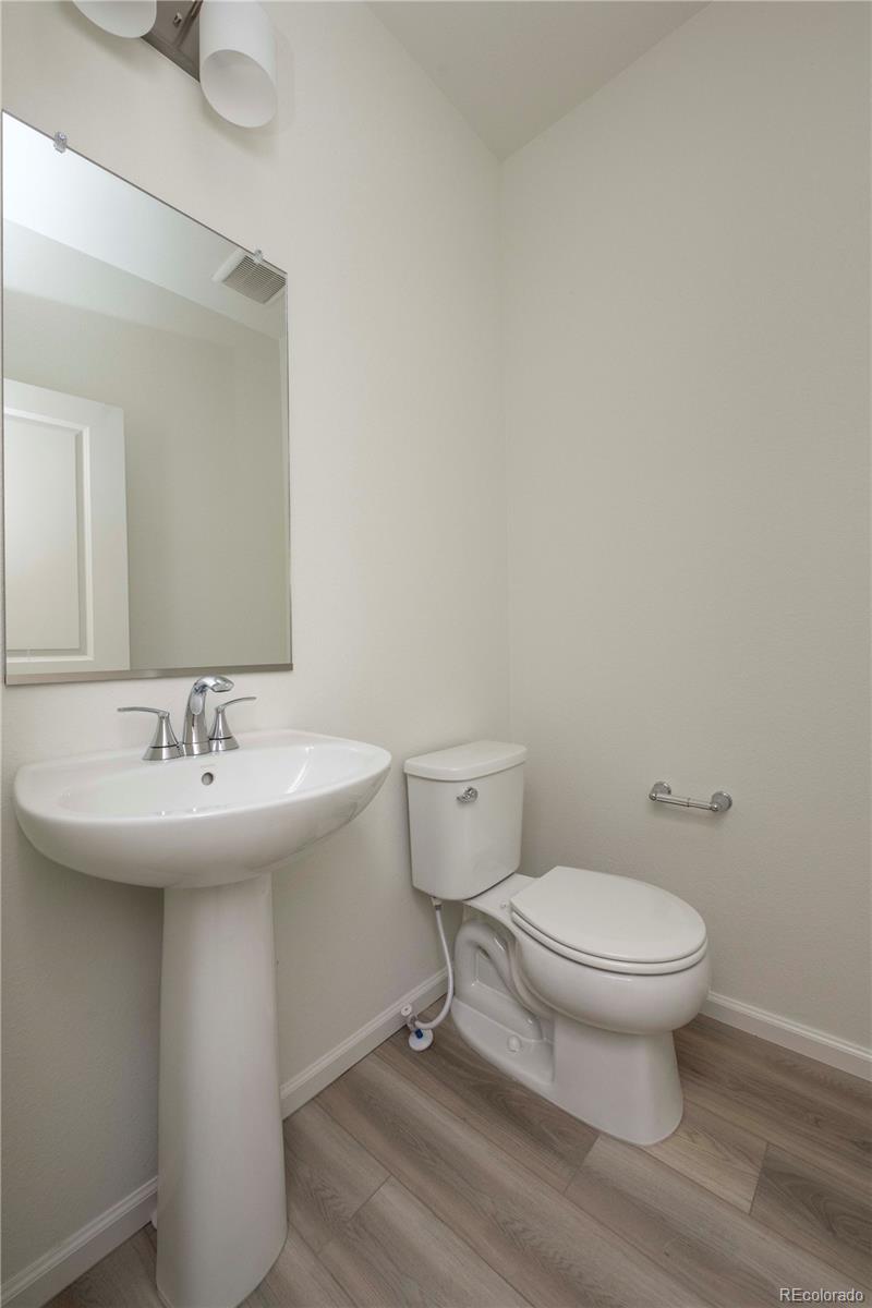 313 Rodden Drive Erie, CO 80516 - Photo 14 of 25 a bathroom with a sink and a toilet