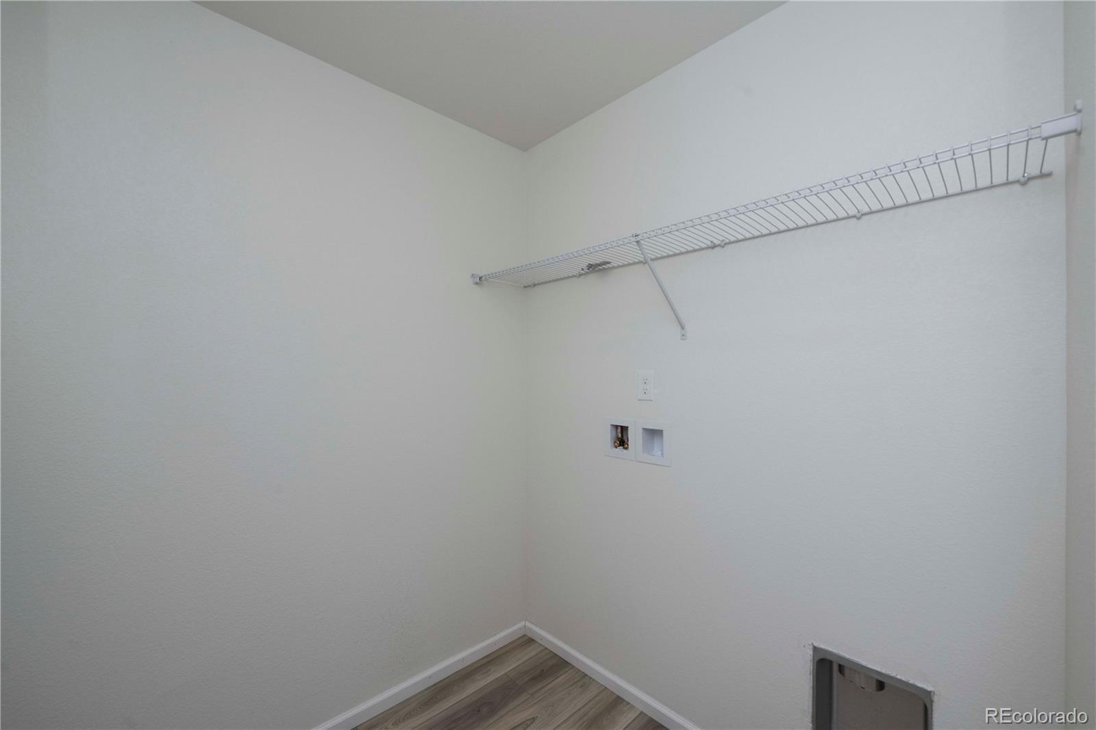 313 Rodden Drive Erie, CO 80516 - Photo 20 of 25 a view of a room with racks on the wall