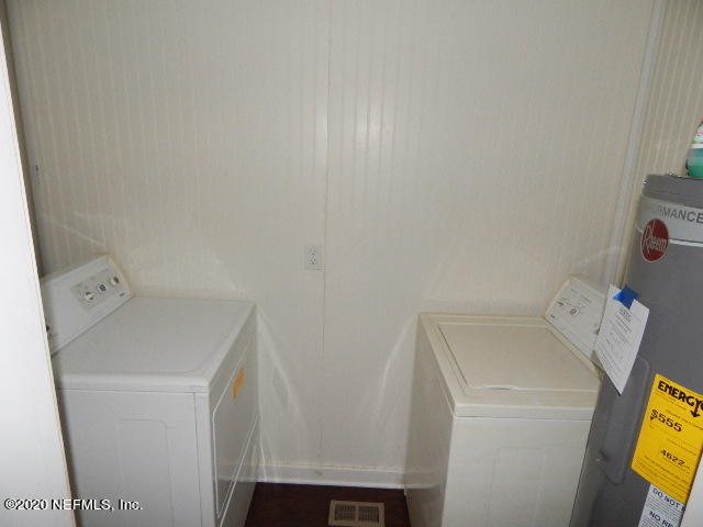786 Community Road Jacksonville, FL 32259 - Photo 8 of 9 a utility room with dryer and washer
