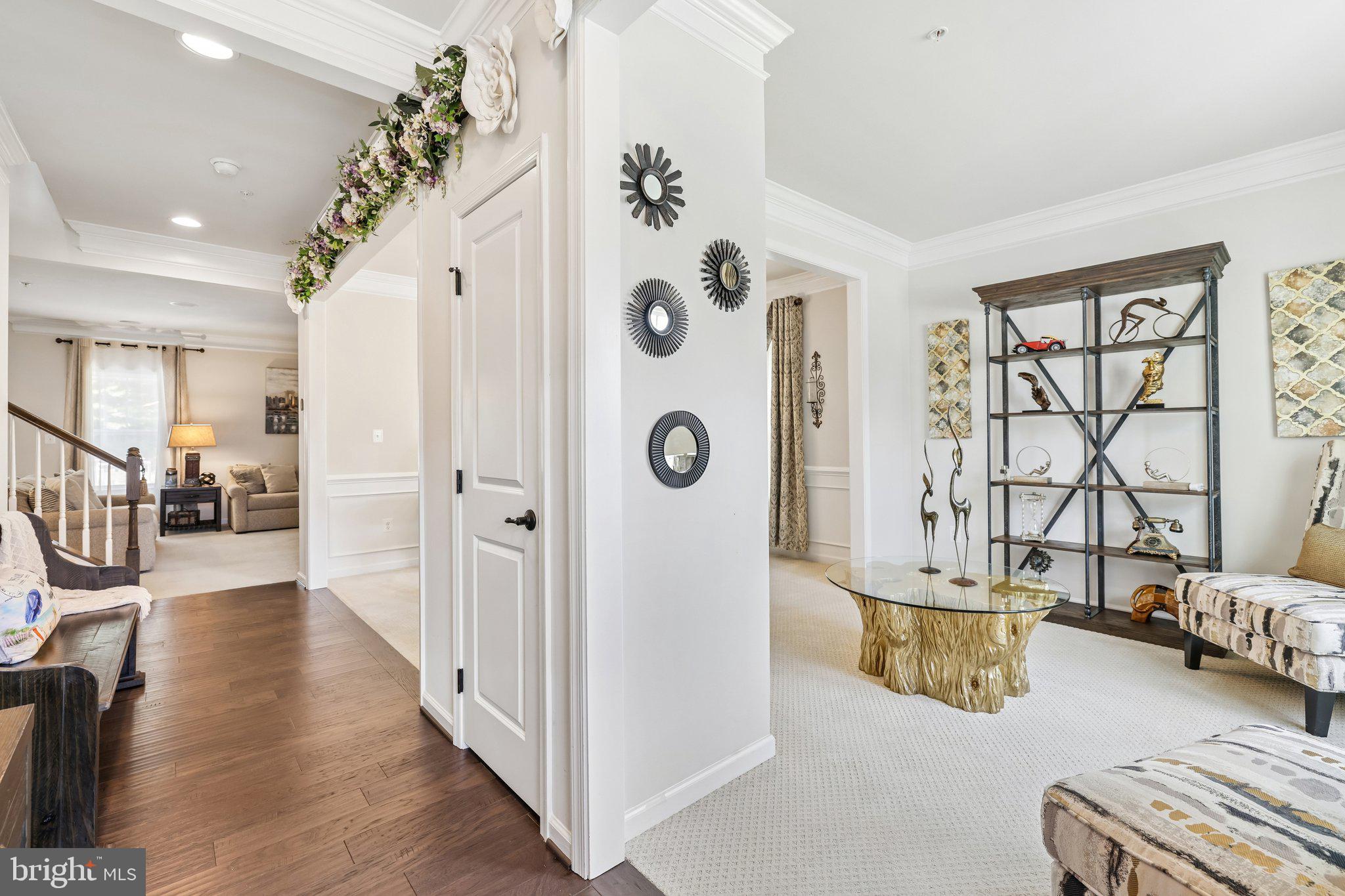 507 Potomac Road Joppa, MD 21085 - Photo 19 of 66 a view of a hallway with wooden floor and windows