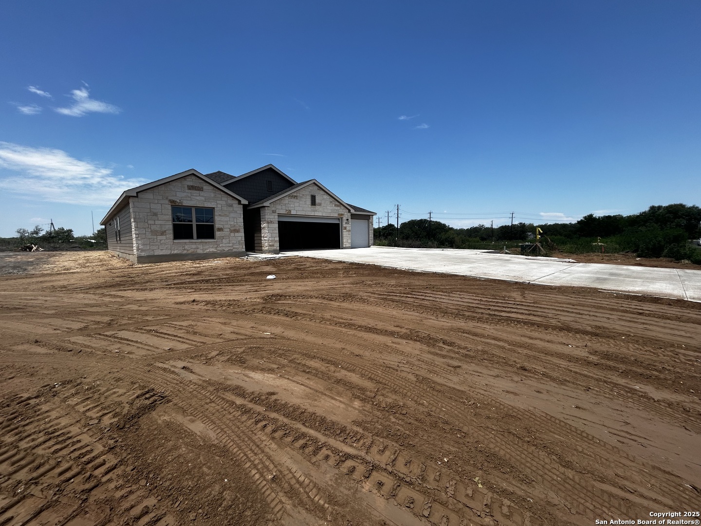 20929 Pleasanton Road San Antonio, TX 78264 - Photo 26 of 51 a view of a house with a yard