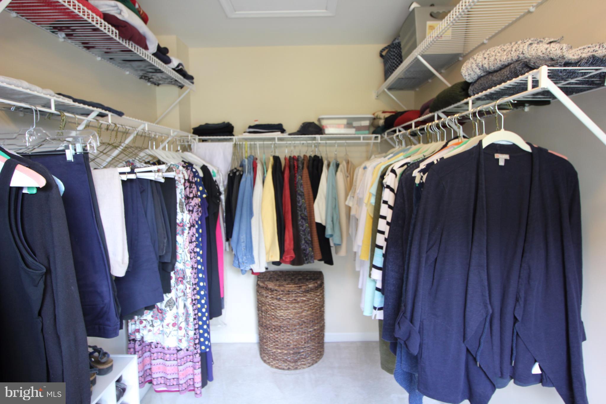 6095 Hanover Road Hanover, MD 21076 - Photo 17 of 30 a view of walk in closet with clothes and shoes