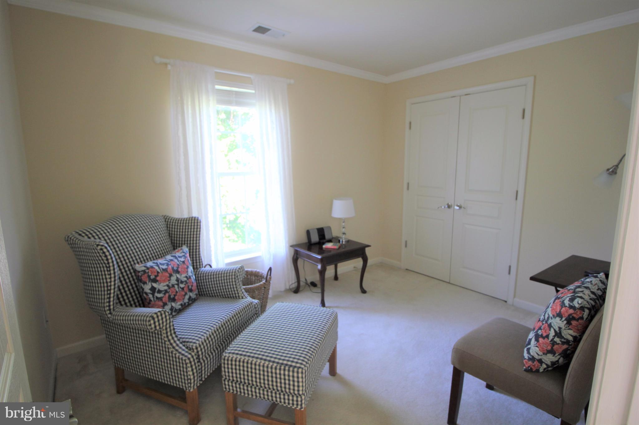6095 Hanover Road Hanover, MD 21076 - Photo 20 of 30 a living room with furniture and a window