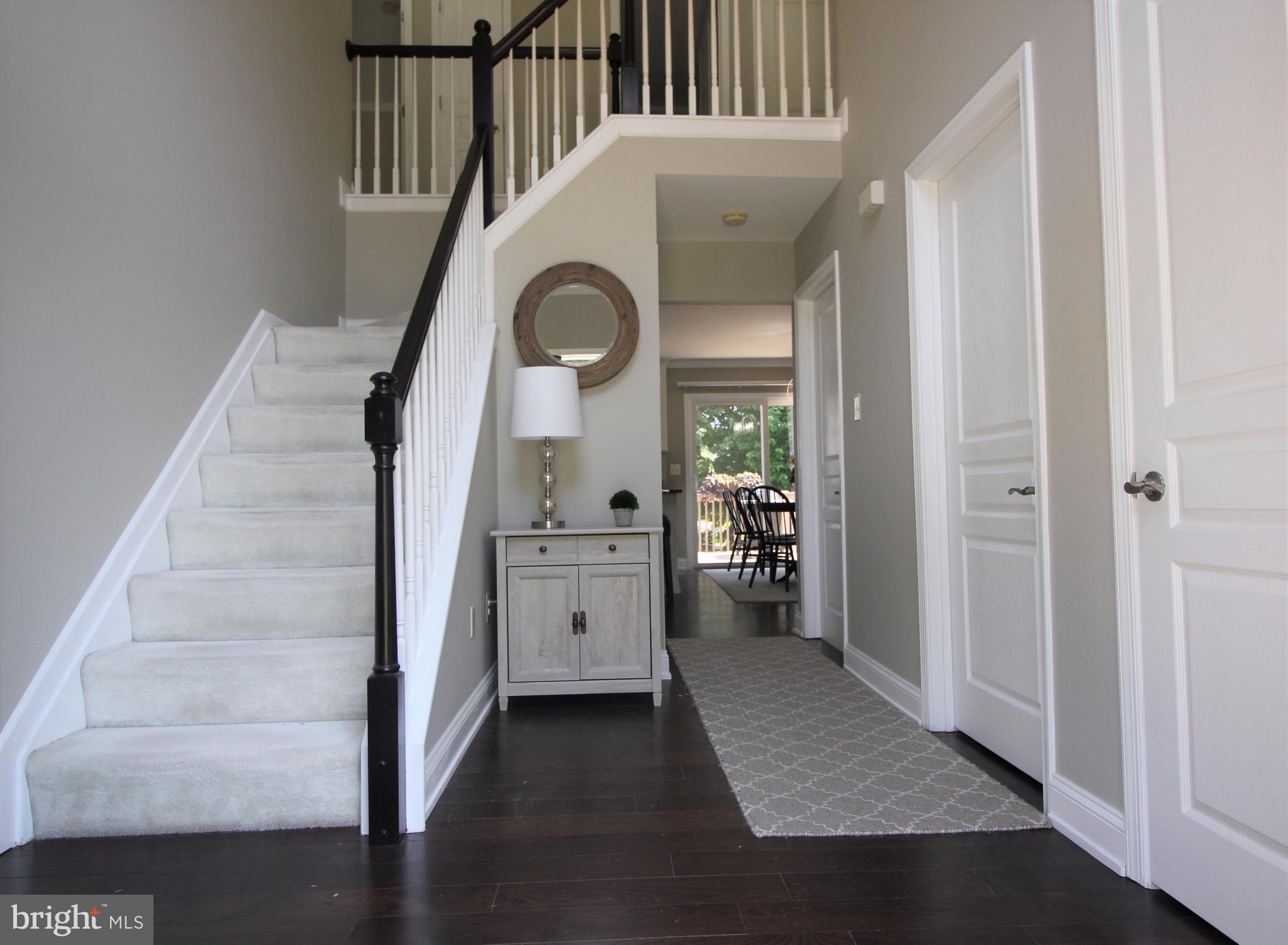 6095 Hanover Road Hanover, MD 21076 - Photo 3 of 30 a view of entryway and hall with wooden floor