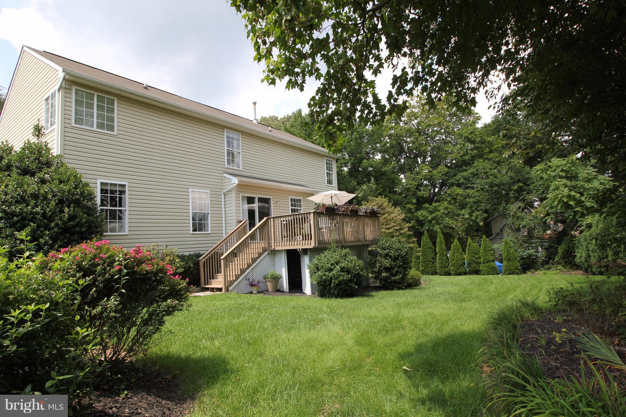 6095 Hanover Road Hanover, MD 21076 - Photo 29 of 30 a view of a house with backyard and garden