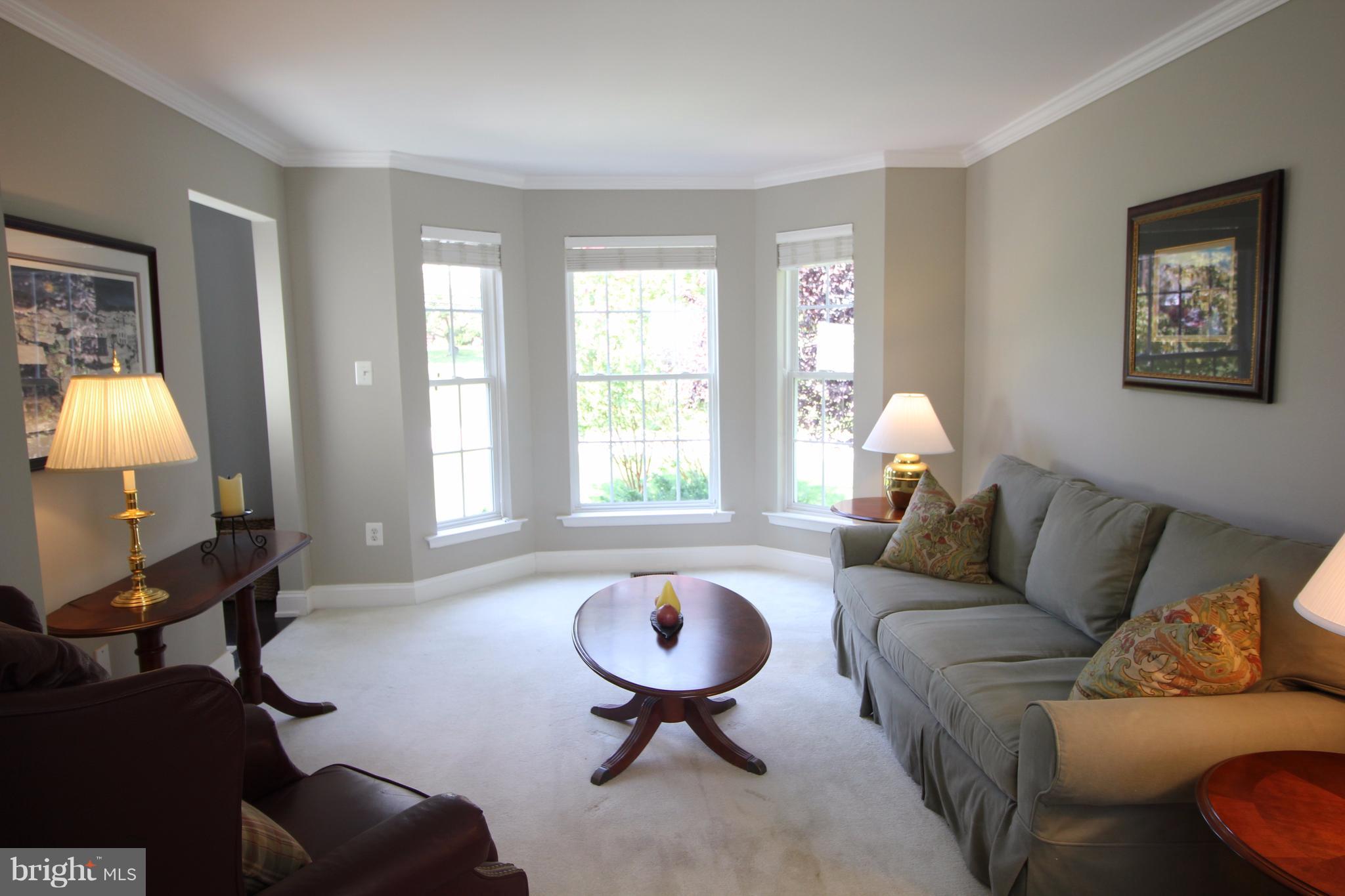 6095 Hanover Road Hanover, MD 21076 - Photo 4 of 30 a living room with furniture and a window