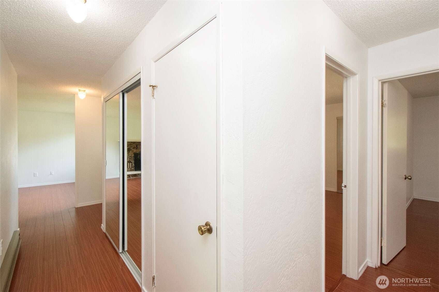 370 Dungeness Meadows Sequim, WA 98382 - Photo 18 of 40 a view of a hallway with wooden floor