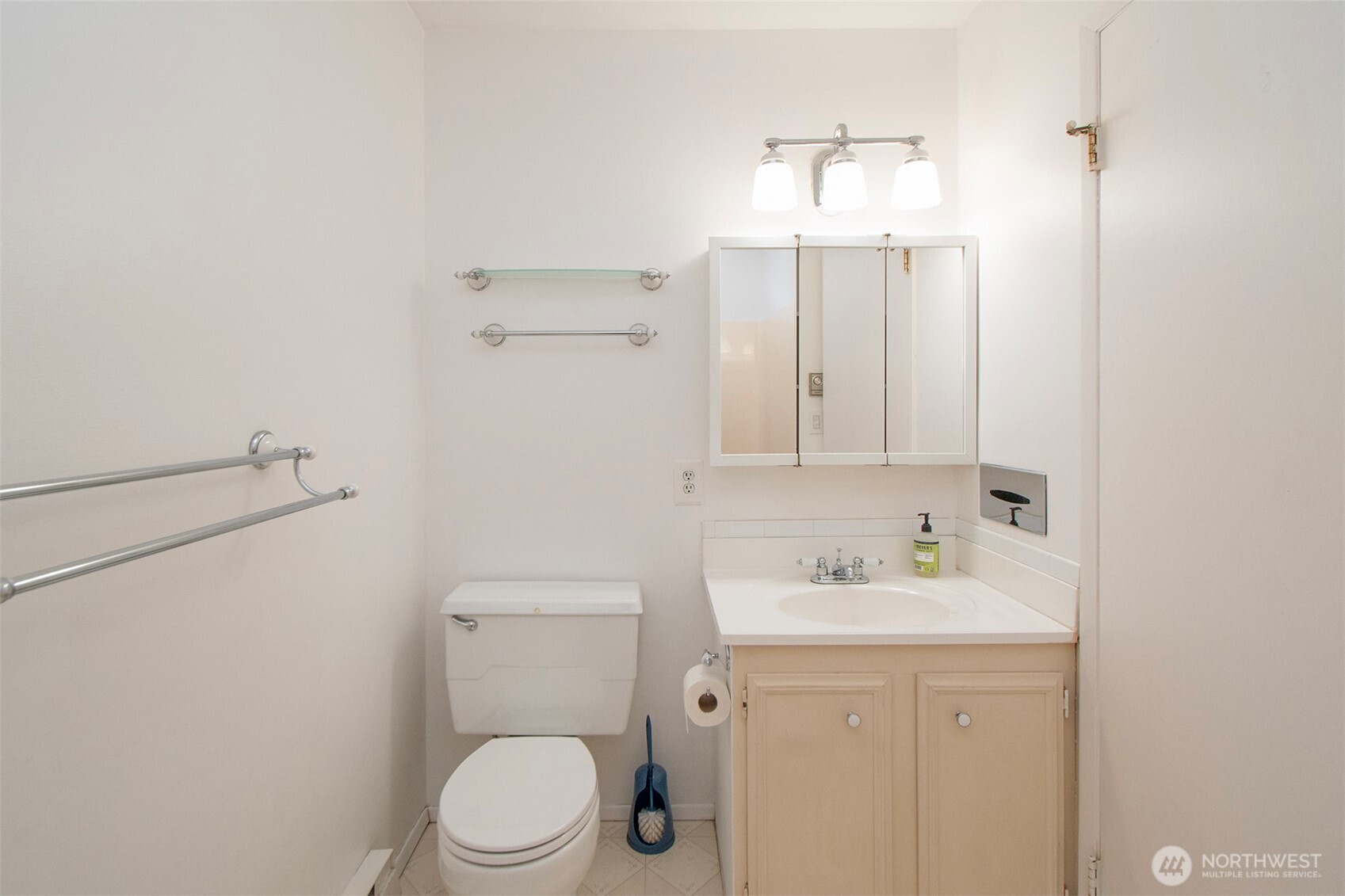 370 Dungeness Meadows Sequim, WA 98382 - Photo 20 of 40 a bathroom with a sink a toilet and mirror