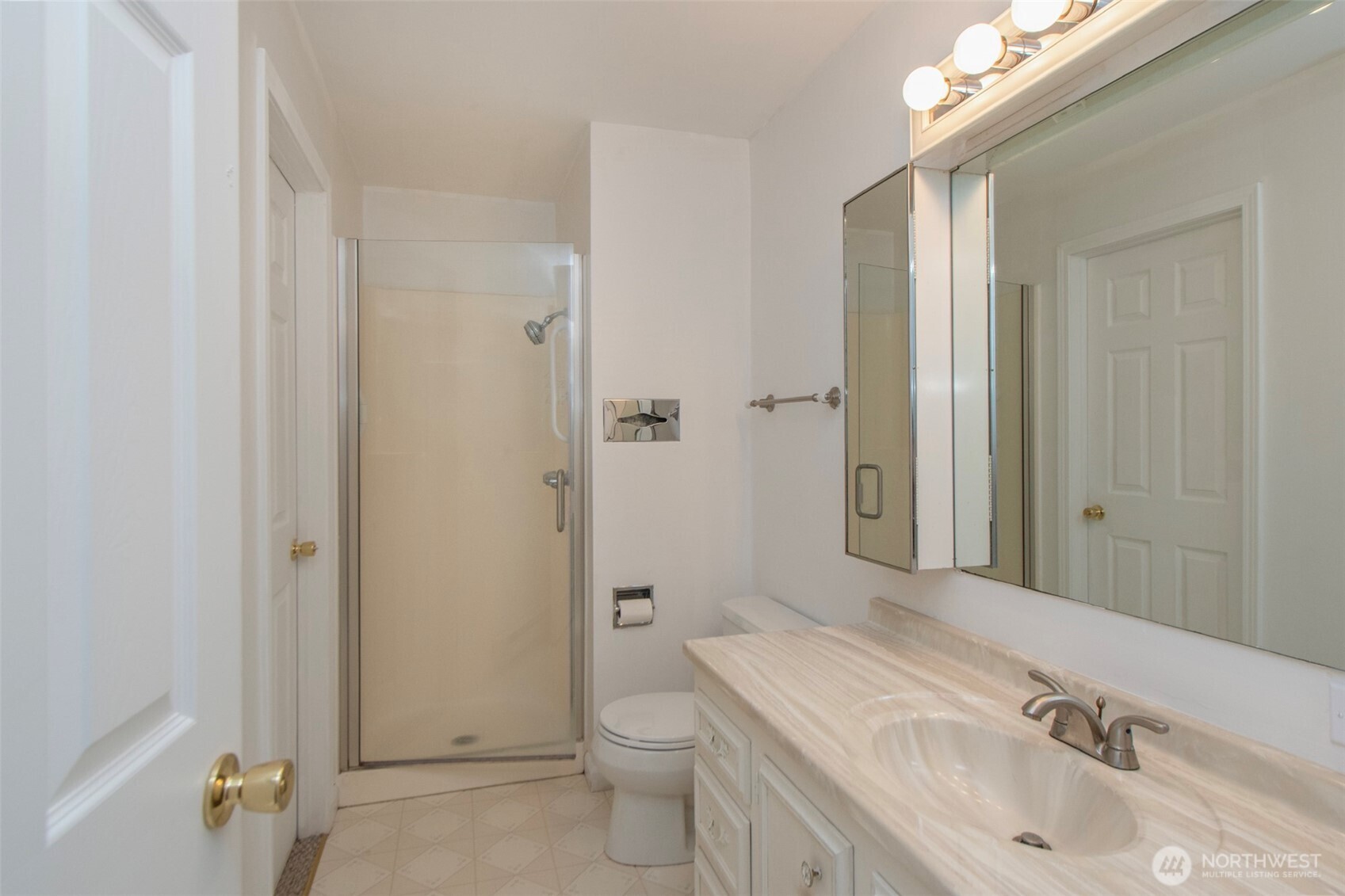 370 Dungeness Meadows Sequim, WA 98382 - Photo 26 of 40 a bathroom with a sink a toilet and shower