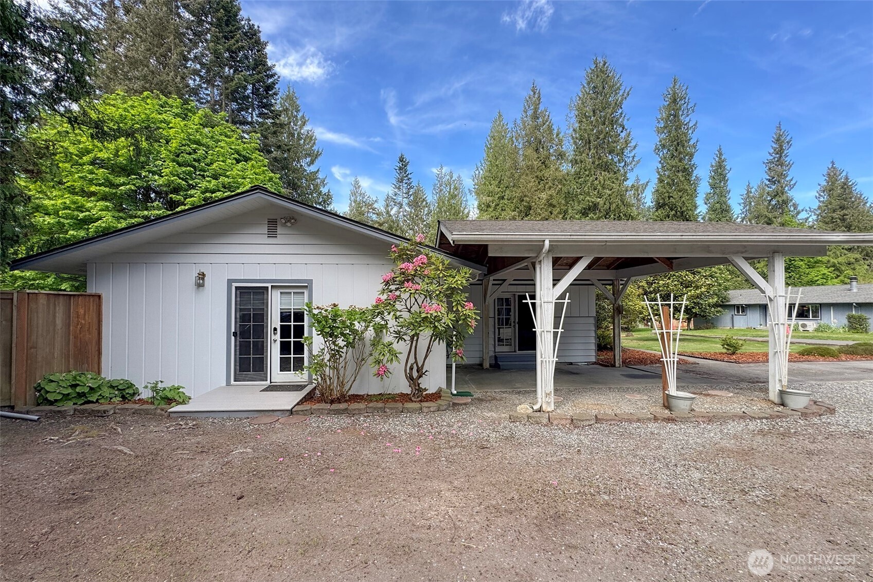 370 Dungeness Meadows Sequim, WA 98382 - Photo 3 of 40 a view of a house with backyard and sitting area