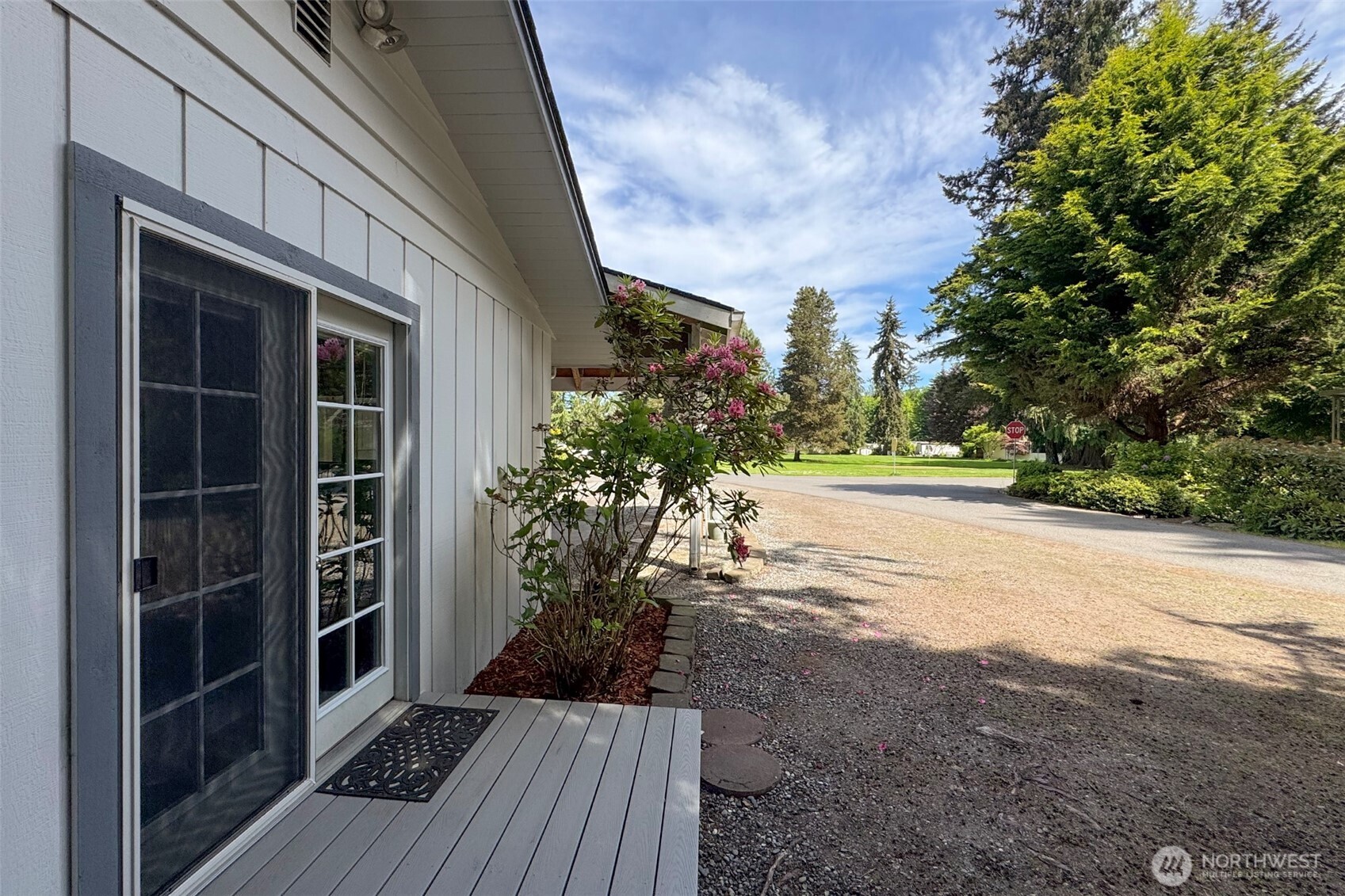 370 Dungeness Meadows Sequim, WA 98382 - Photo 31 of 40 a view of a house with a yard