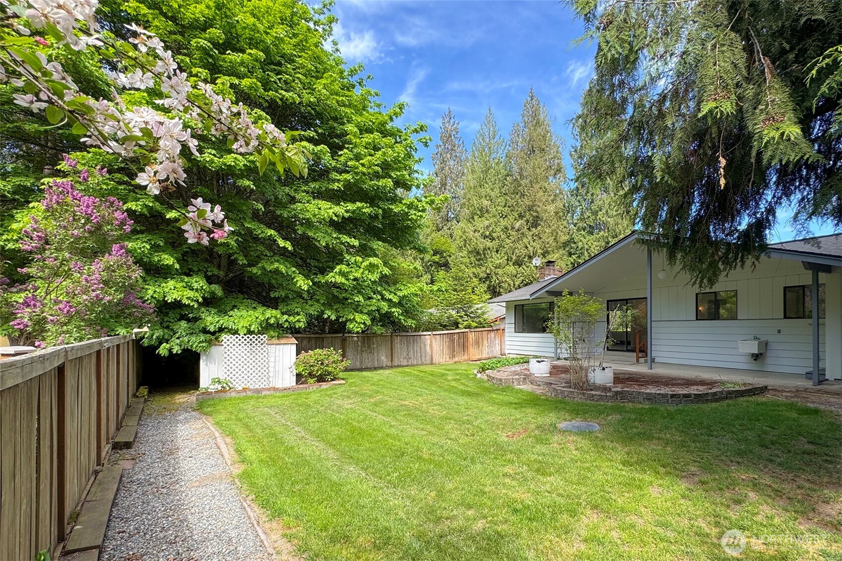 370 Dungeness Meadows Sequim, WA 98382 - Photo 34 of 40 a front view of a house with a yard
