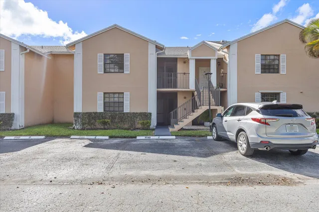 a car parked in front of a house
