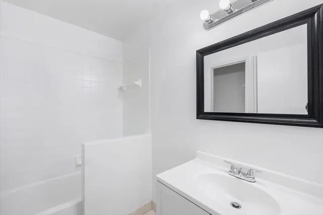 a view of balcony with wooden floor