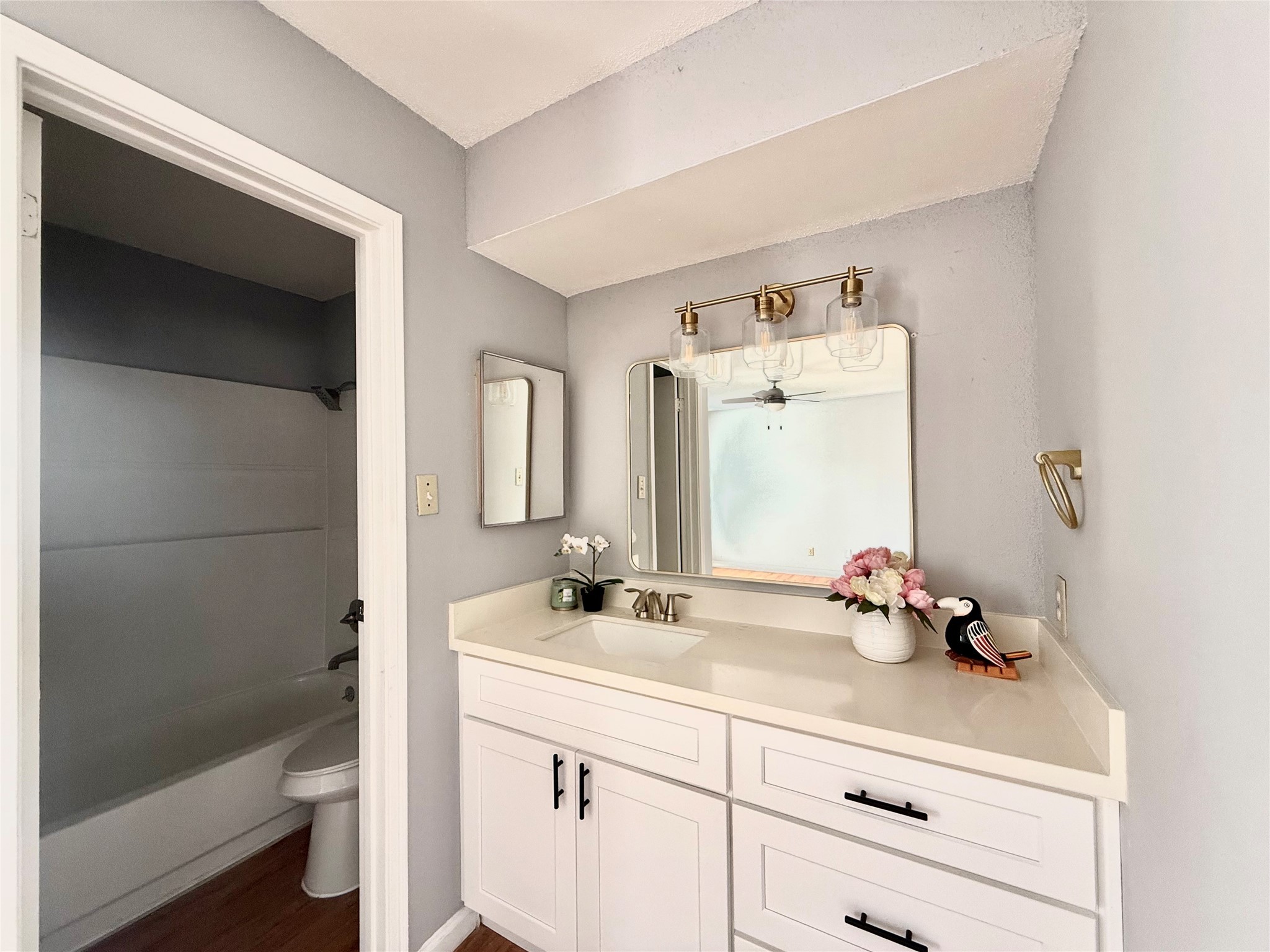 7200 West T C Jester Boulevard, Unit 3902 North Houston, TX 77088 - Photo 13 of 16 a bathroom with a sink a toilet and shower