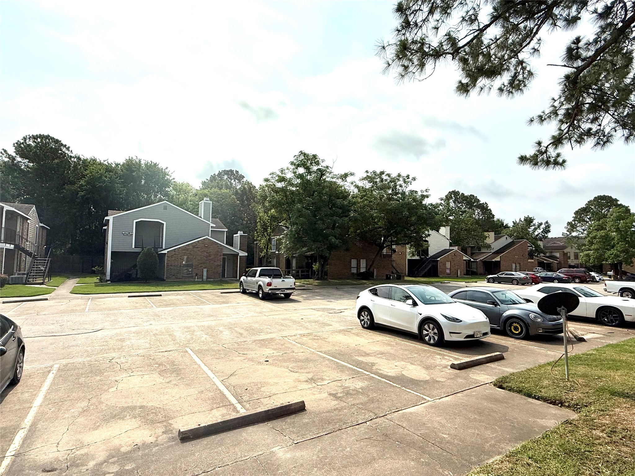 7200 West T C Jester Boulevard, Unit 3902 North Houston, TX 77088 - Photo 16 of 16 a view of car parked on the side of a street